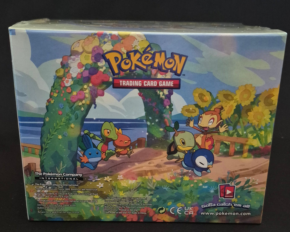Achterkant van Pokémon TCG Celebrations Mini Tin Display met 8 Engelse tins – mint factory sealed